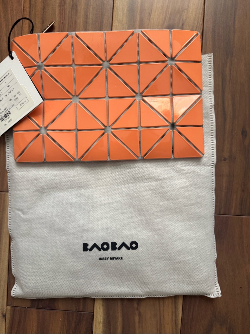 Issey Miyake Bright Orange Triangular Panel Wristlet Clutch